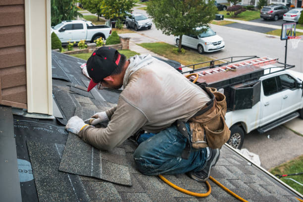 Professional Gutter Repair And Installation technician working in Benton, IA